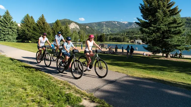 Cyclists on a paved trail in the Vail Valley