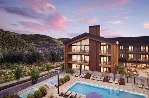 SKJÓL residences above the heated pool at sunset